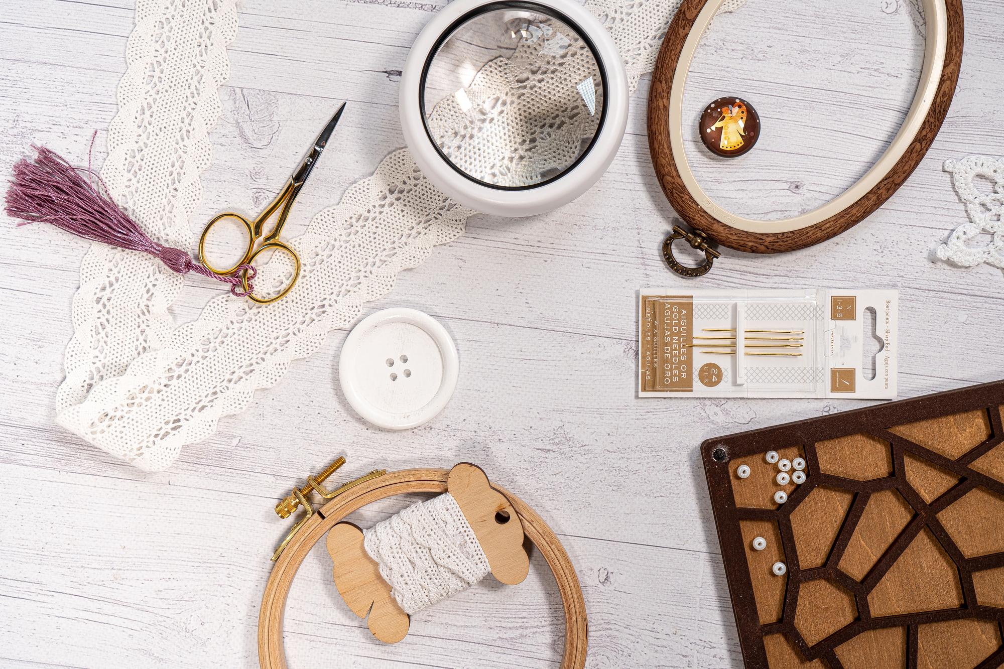 flat lay of embroidered patches and tools